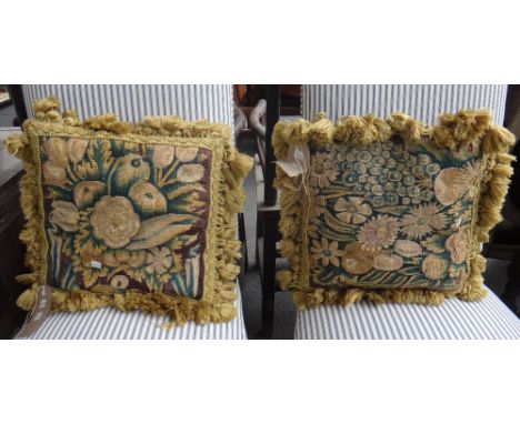 A group of eight cushions made from 17th century verdure tapestry fragments. (8)