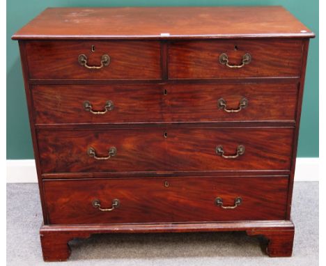 A George III mahogany chest of two short and three long graduated drawers, on bracket feet, 113cm wide.