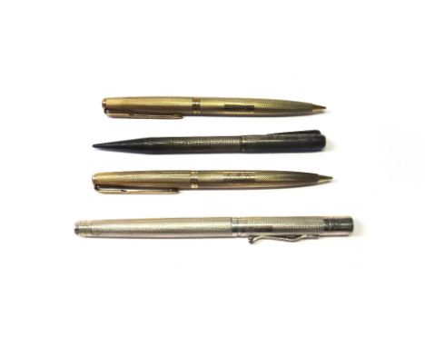 A Yard o Led silver fountain pen, circa 2009, a vintage Yard o Led silver propelling pencil and two Parker 9ct gold propellin