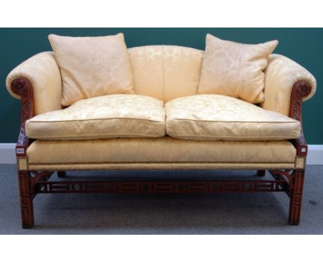 After the St Giles Suite; a 20th century, mahogany framed three piece suite to comprise a humpback sofa and pair of Gainsboro