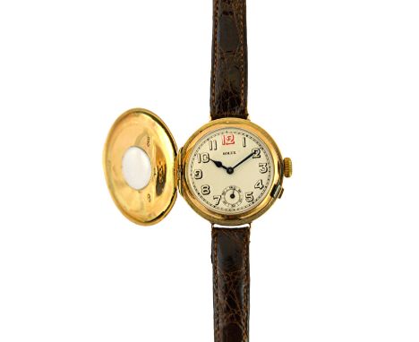 A 9ct gold circular half hunting cased Rolex wristwatch, the jewelled lever movement detailed Rolex 15 jewels Swiss Made, the