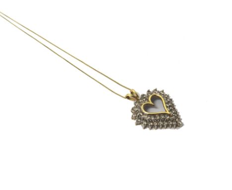 A gold and diamond set pendant, pierced in an openwork heart shaped design mounted with two rows of circular cut diamonds, de