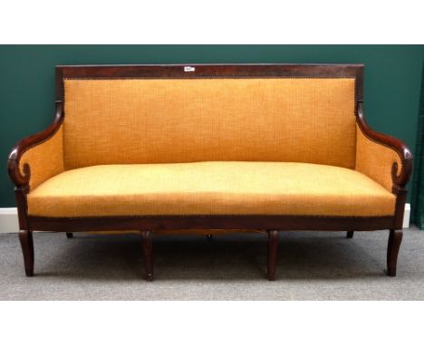 An early 19th century French mahogany framed sofa with bow seat on sabre supports, 180cm wide. 