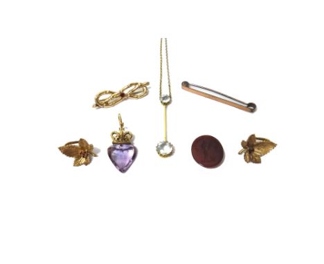 A pale blue gem set pendant necklace, a gold and oval cornelian intaglio ring (damaged), a 9ct gold mounted amethyst pendant,