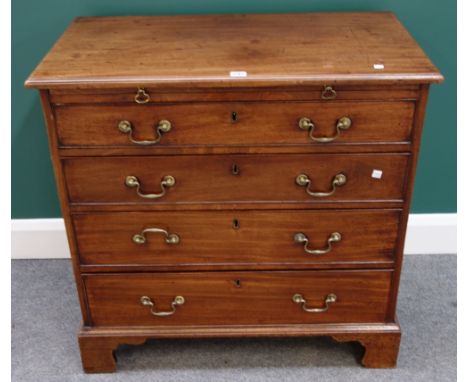 A George III mahogany chest of drawers, the brushing slide over four long graduated drawers, on bracket feet, 84cm wide.