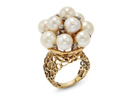 A cultured pearl and diamond ring, by John Donald, 1971 Designed as a cluster of cultured pearls interspersed with single-cut