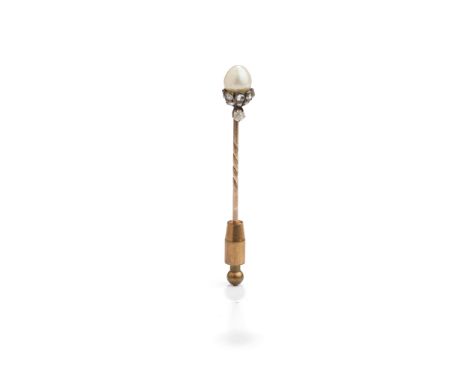 A late 19th century pearl and diamond stick pin Modelled as an acorn, the ovoid pearl above a rose-cut diamond base, and old 