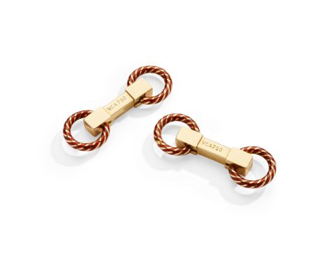A pair of enamel cufflinks, by Van Cleef &amp; Arpels Double-sided: each circlet terminal with orange enamel banded decoratio