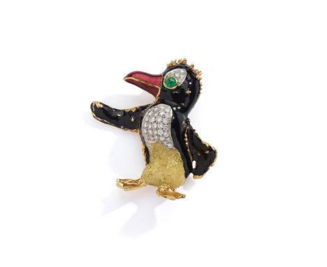 An enamel and gem-set novelty brooch, by Kutchinsky, circa 1970 Designed as a penguin, decorated with black, red and yellow e