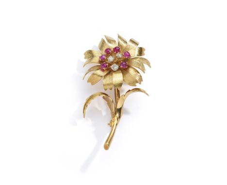 § A ruby and diamond flower brooch, by H J Company, 1962 Set with a cluster of brilliant-cut diamonds and circular cabochon r