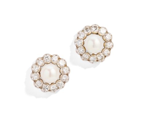 A pair of cultured pearl and diamond cluster earrings Each 9.5mm cultured pearl, within a brilliant-cut diamond surround, pos