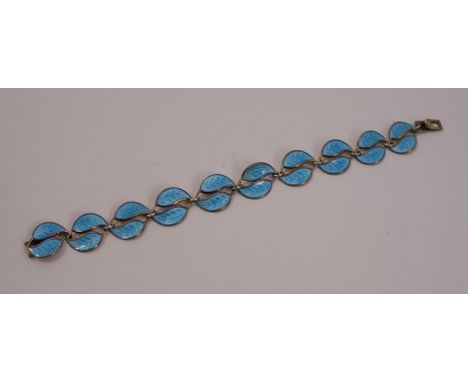 A David-Andersen enamelled bracelet, designed by Willy Winnaess, composed of two rows of light blue leaves, length 17cm, stam