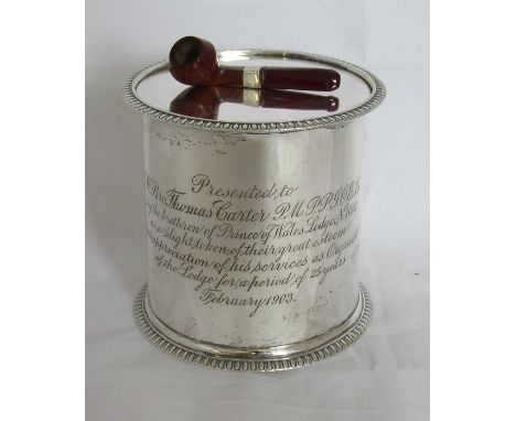 A late Victorian silver tobacco jar and cover, of cylindrical form with gradrooned edge, the finial formed as a pipe, bearing
