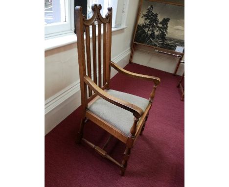 A set of 10 (8 + 2) light oak dining chairs, with lathe back