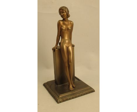 A Lorenzl patinated&nbsp;spelter&nbsp;table lighter, modelled as a nude leaning on a column, height 8.5insCondition Report:  