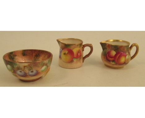 A Royal Worcester miniature milk jug, cream jug and sugar bowl, all decorated with fruit&nbsp;Condition Report:  All in good 