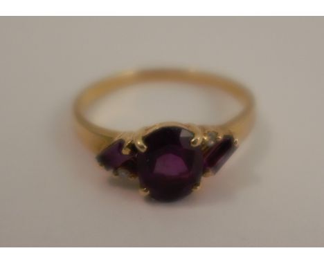 An amethyst and diamond dress ring, stamped '14k', finger size P, 2.4g gross