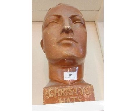 A brown Christy's head mannequin