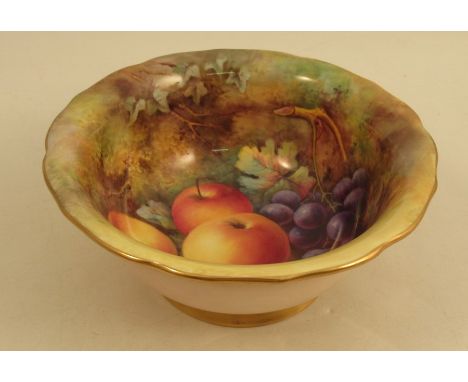 A Royal Worcester Bennett bowl, decorated the the interior with fruit by T Lockyer, dated 1935, diameter 7.25insCondition Rep