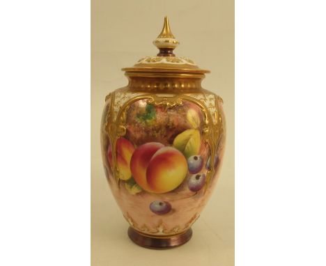 A Royal Worcester quarter lobbed covered vase, decorated half round with fruit by Roberts, shape number H169, dated circa 195