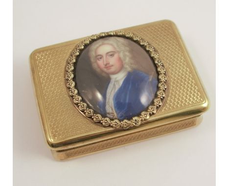 A Georgian silver gilt snuff box, or rectangular form, the top set with an oval enamel plaque decorated with a portrait of a 