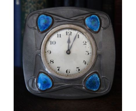 Archibald Knox designed Tudric,&nbsp;pewter travelling clock with four blue enamelled panels, retailed by&nbsp;&nbsp;Liberty`