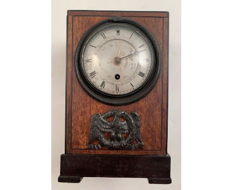 A 19th century mahogany cased mantle clock, by Vulliamy of London, the circular dial with Roman numerals, having date and day