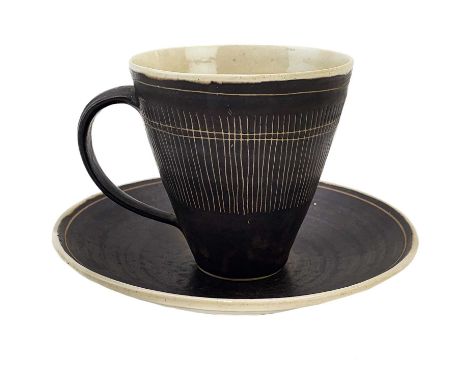 Lucie RIE (1902-1995) Cup and saucer (Circa 1950's) Ceramic, impressed personal Lucie Rie and Hans Coper seals to base, overa