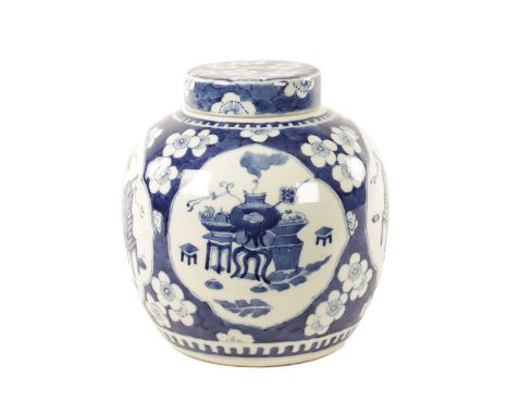 A 19TH CENTURY CHINESE BLUE AND WHITE GINGER JAR AND COVER decorated with panel scenes of antiquities.20cm highunder UV light