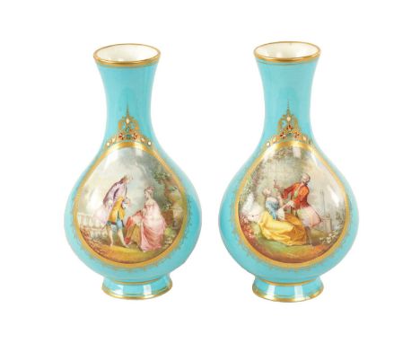 A PAIR OF 19TH CENTURY FRENCH SERVES PORCELAIN VASES of bulbous form with painted panels of classical figures16cm high In goo
