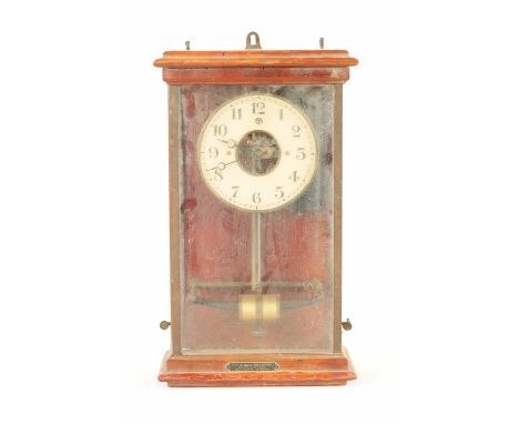 AN EARLY 20TH CENTURY FRENCH BULLE TYPE ELECTRIC CLOCK in glazed mahogany case40cm high
