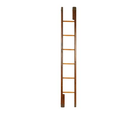 A SET OF COUNTRY HOUSE LEATHER BOUND FOLDING LIBRARY STEPS/LADDER with brass studded decoration and brass caps, fitted six tu