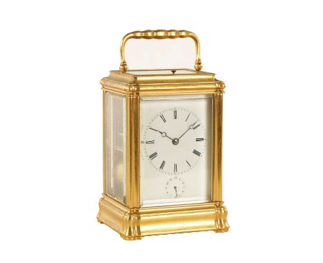 A GOOD 19TH CENTURY FRENCH REPEATING CARRIAGE CLOCK WITH ALARM the gilt brass gorge case with folding handle and bevelled gla