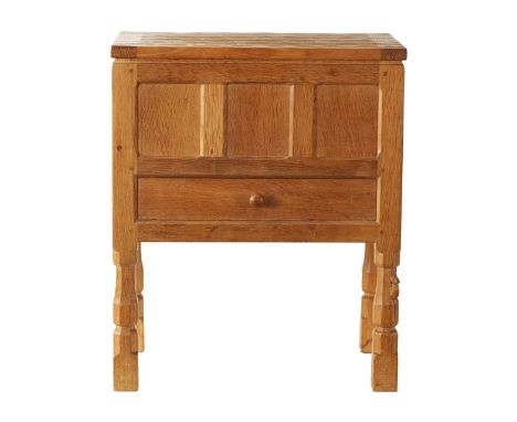 A ROBERT 'MOUSEMAN' THOMPSON JOINED ADZED LIGHT OAK SEWING BOX/SIDE CABINET of panelled form with hinged lid and fitted friez