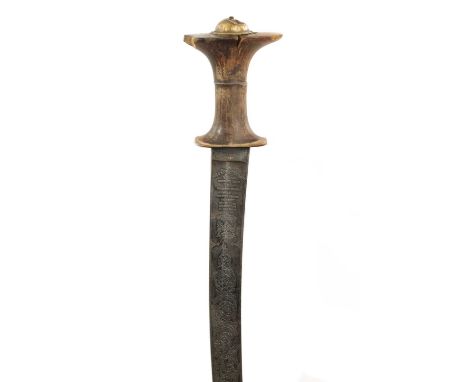 A MENELIK II (1889-1913) ETHIOPIAN GURADE/SABER WITH WILKINSON BLADE the etched curved blade decorated with scrolling leafage