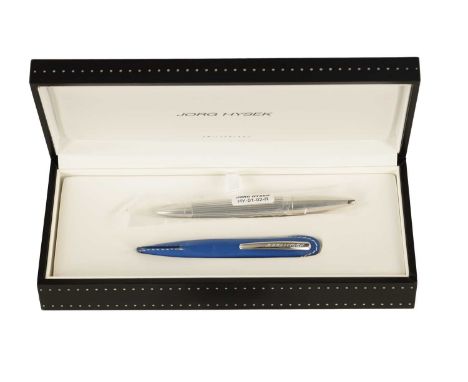 A JORG HYSEK ROLLERBALL / BALLPOINT PEN with a blue snakeskin leather pen case comes with box papers and a stand.13cm long