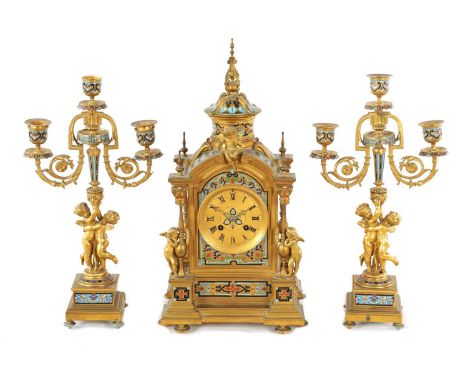 A FINE 19TH CENTURY FRENCH ORMOLU AND CLOISONNÉ ENAMEL THREE PIECE CLOCK GARNITURE with urn-shaped top and seated cherub abov