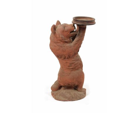A 19TH CENTURY ‘WITHNELL’ BRICK &amp; TERRACOTTA LTD. LANCASHIRE STANDING MODEL OF A BEAR WAITER holding a raised dish.53cm h