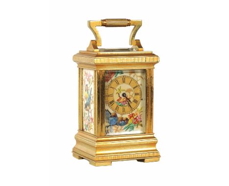 A LATE 19TH CENTURY FRENCH MINIATURE PORCELAIN PANELLED CARRIAGE CLOCK the gilt brass case with reeded handle and painted por