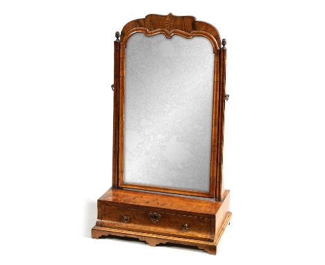 A QUEEN ANNE BURR WALNUT TOILET MIRROR the star inlaid shaped rectangular swivel mirror above a herring-banded base and a sha