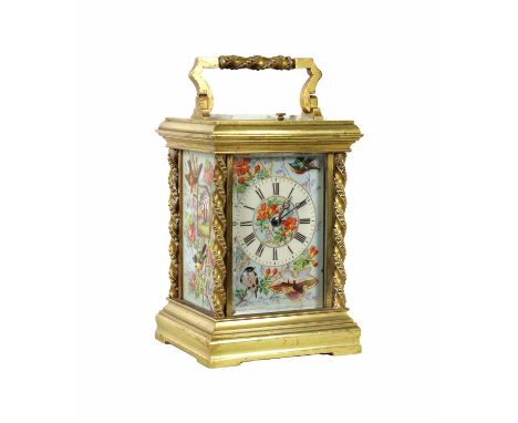 A LATE 19TH CENTURY FRENCH PORCELAIN PANELLED REPEATING CARRIAGE CLOCK the brass case with rope twist corner columns inset on