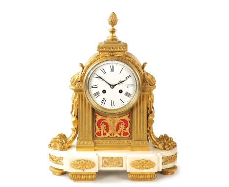 A MID 19TH CENTURY FRENCH ORMOLU AND WHITE MARBLE MANTEL CLOCK with acanthus leaf moulds and pineapple finial above reeded co