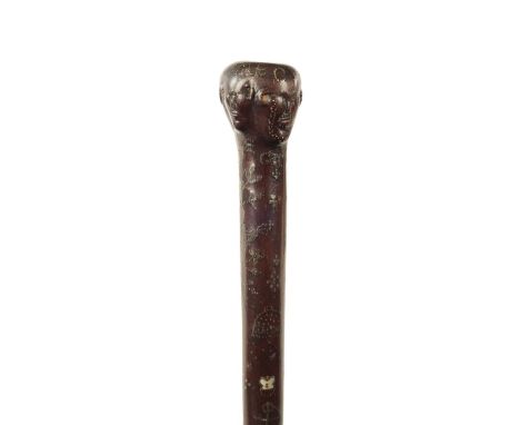 A GOOD MID-19TH CENTURY FOLK ART MARRIAGE WALKING STICK inlaid with brass stud work and mother-of-pearl highlights. depicting