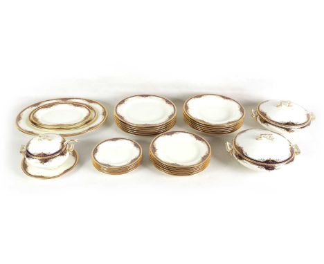 AN EARLY 20TH CENTURY CAULDON LTD. SIX PIECE DINNER SERVICE with royal blue and gilt decorated borders, comprising six dinner