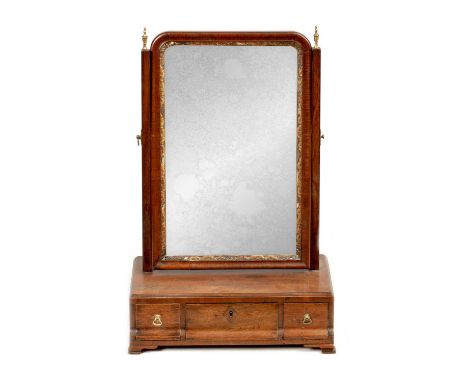 A GEORGE III MAHOGANY TOILET MIRROR with gilt carved inner border and D moulded base fitted with frieze drawers and shaped br
