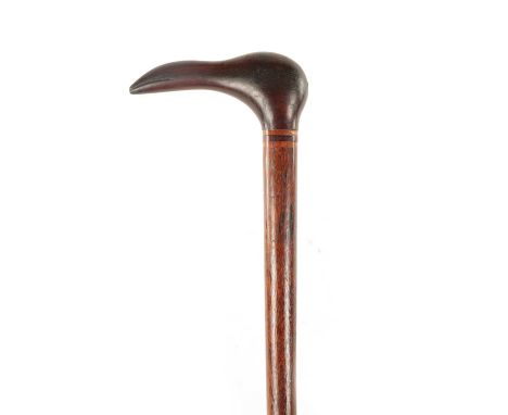 A 19TH CENTURY PETCAIRN ISLAND CARVED HARDWOOD WALKING STICK with birds head shaped handle 88cm overall
