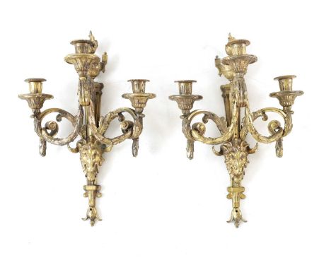 A PAIR OF 19TH CENTURY ORMOLU THREE BRANCH HANGING WALL LIGHTS with rams head mounts, swagwork leaf cast frames and urn-shape