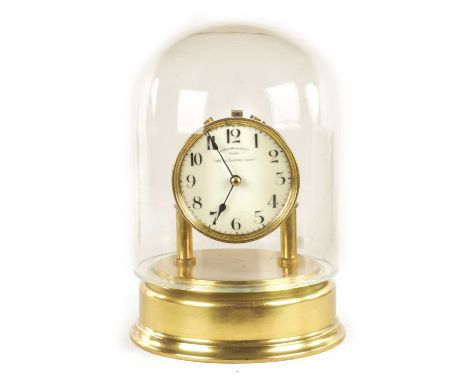 AN EARLY 20TH CENTURY ELECTRIC EUREKA MANTEL CLOCK having an enamel dial with Ararbic numerals fronting a brass battery power
