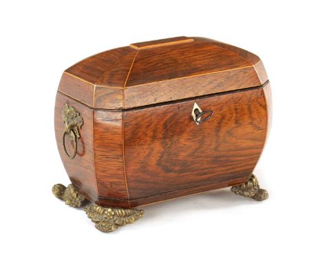 A REGENCY ROSEWOOD AND BOXWOOD INLAID BOMBE SHAPED TEA CADDY with panelled hinged top revealing a lidded interior; raised on 