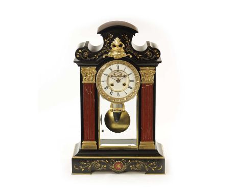 AN IMPRESSIVE 19TH CENTURY CENTURY ORMOLU MOUNTED BLACK SLATE AND ROUGE MARBLE MANTEL CLOCK the shaped pediment above reeded 